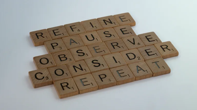 Scrabble tiles spelling research-related words